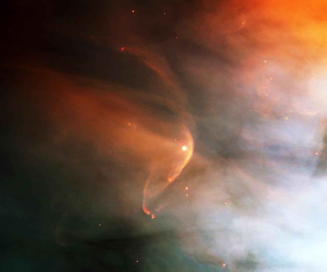 Astronomers using NASA's Hubble Space Telescope have found a bow shock around a very young star in the nearby Orion nebula, an intense star-forming region of gas and dust.